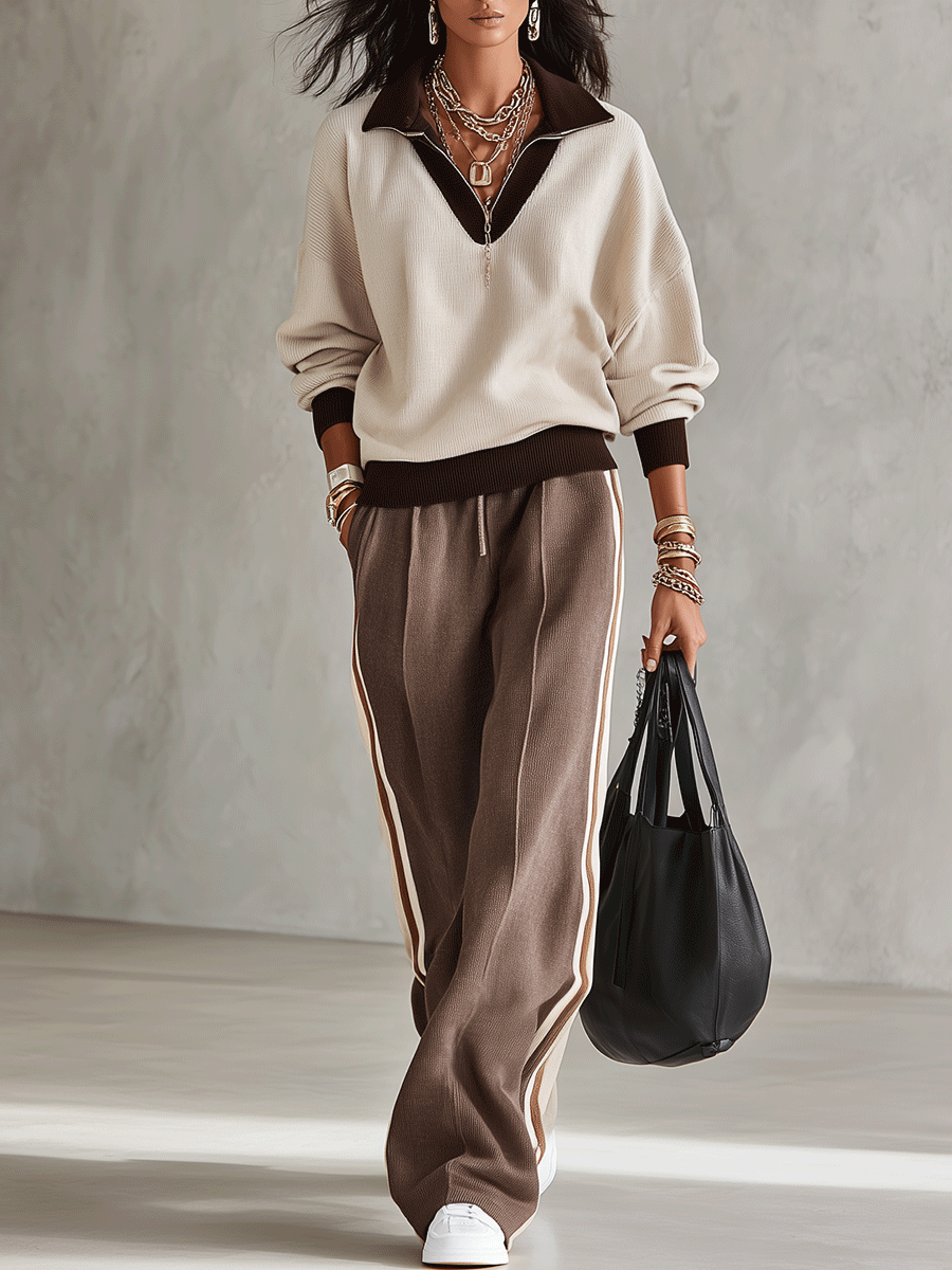 QUISTELLO - Completo beige con top scollo V e pantaloni rigati a gamba larga
