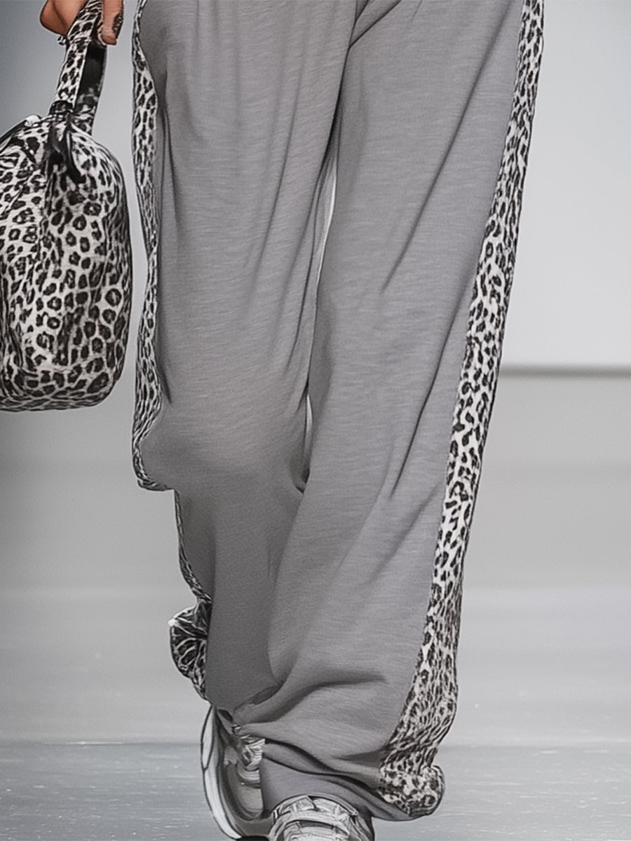 Set due pezzi con felpa e pantaloni con dettagli animalier
