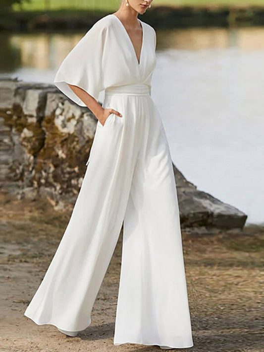 BARADILI - anca elegante con scollo a V, maniche corte e gamba ampia