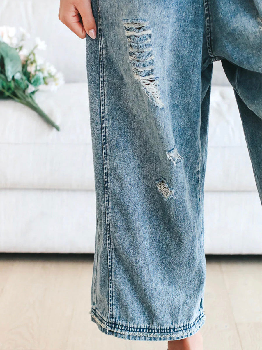 GIULIA - Salopette denim blu dal fit ampio distressed