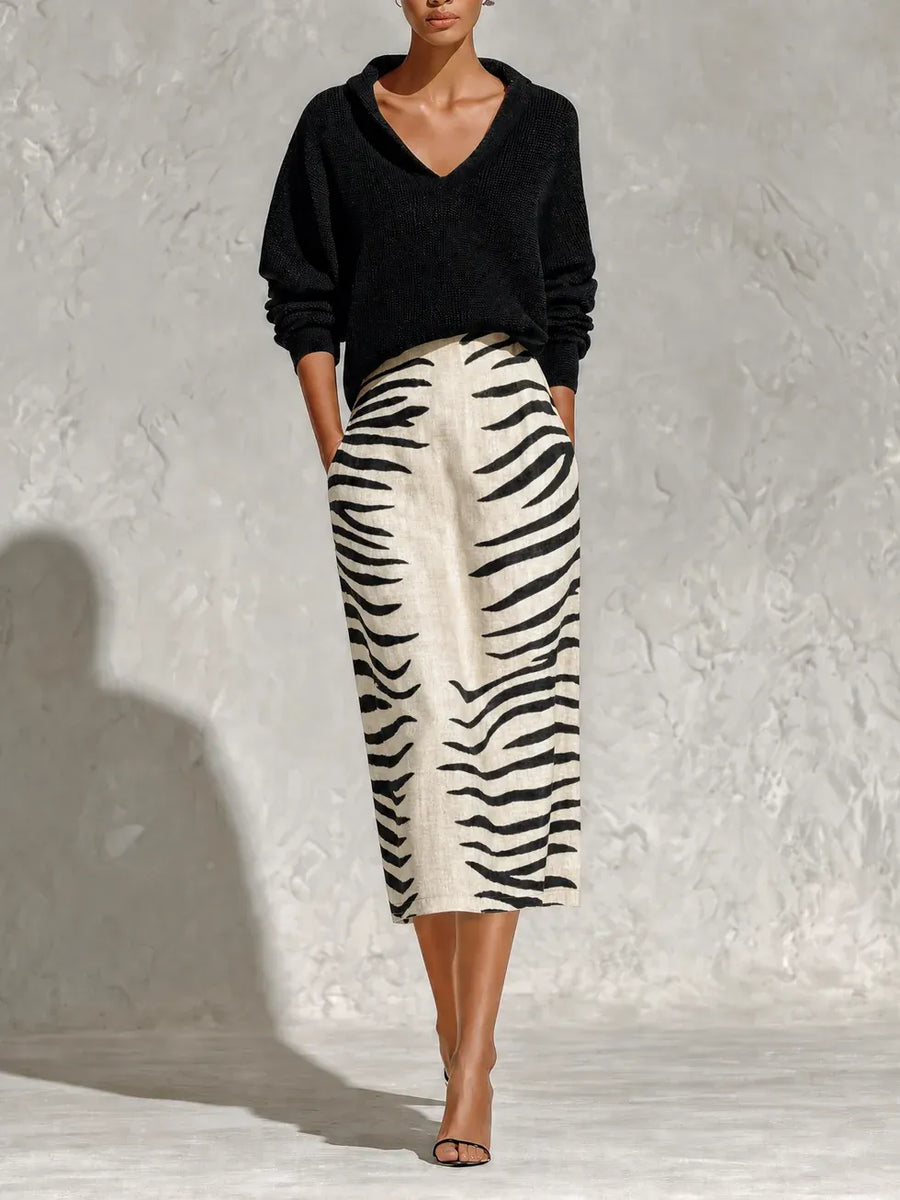 NIARDO - Set due pezzi con maglione nero e gonna midi zebrata avorio