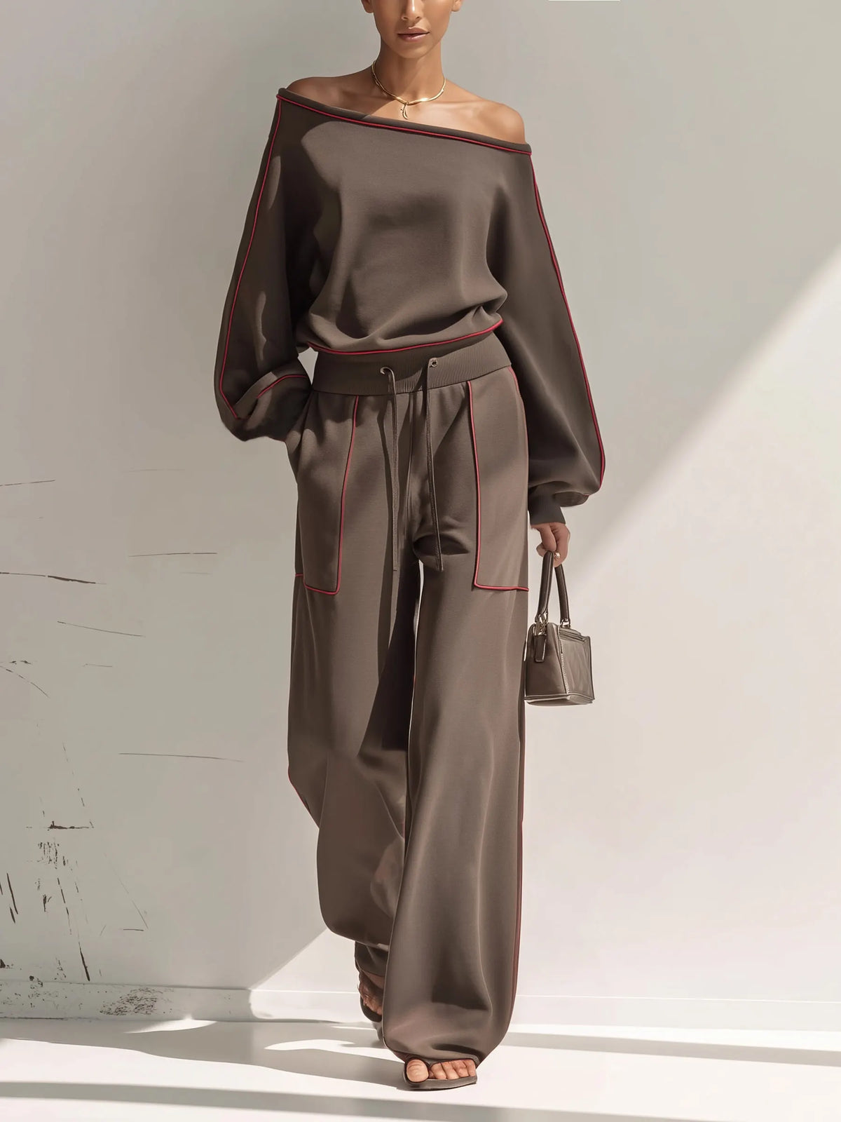FONTE - Completo marrone asimmetrico con pantaloni wide leg