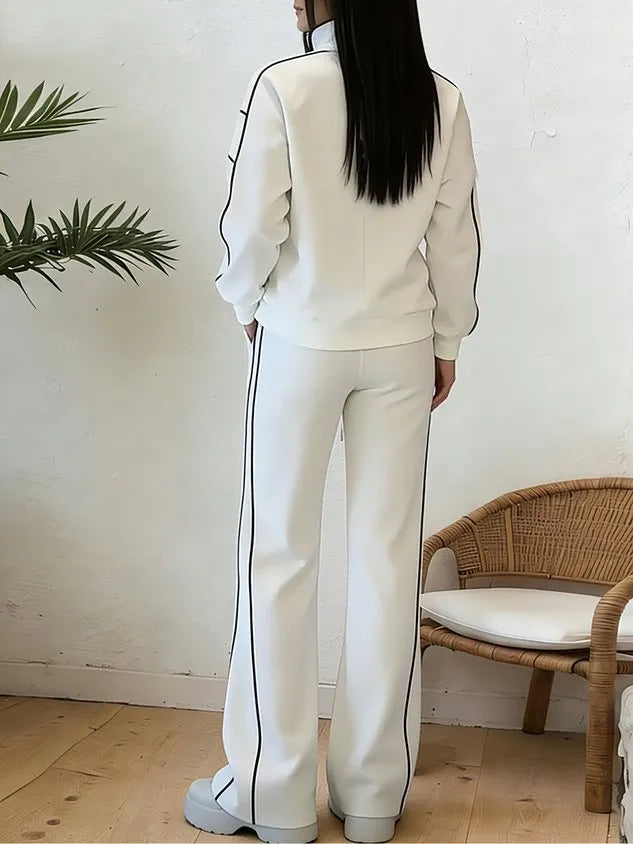 Set due pezzi con giacca e pantaloni con linee sportive