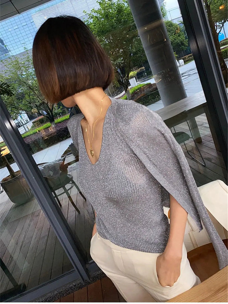 CAPALBIO - Cardigan sciancrato con scollo a V e bottoni perlati