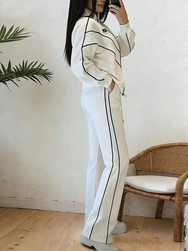 Set due pezzi con giacca e pantaloni con linee sportive