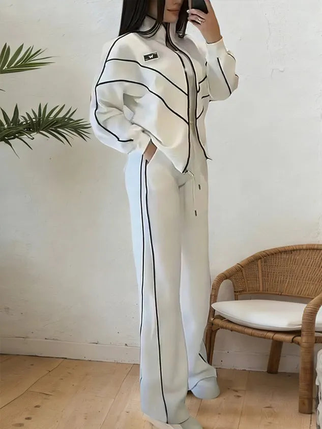 Set due pezzi con giacca e pantaloni con linee sportive