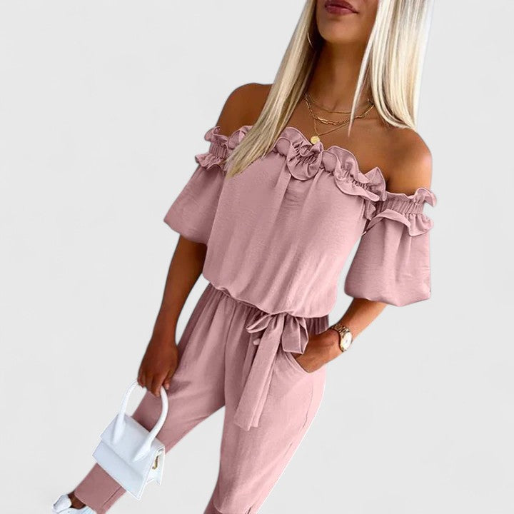 LIVIA - Jumpsuit moderna disponibile in albicocca, nero, verde militare e rosa