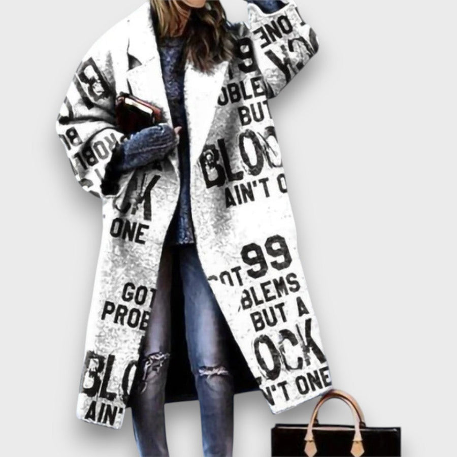 CREMOLINO - Cappotto oversize lungo dal carattere moderno