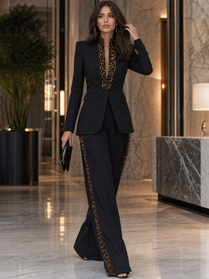 EUROPA - Tailleur nero blazer e pantaloni ampi con bordo leopardato