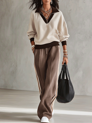 QUISTELLO - Completo beige con top scollo V e pantaloni rigati a gamba larga