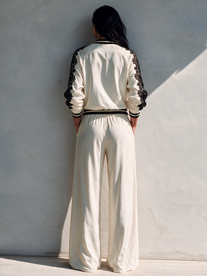 CLETO - Set bianco con top corto e pantaloni ampi in pizzo