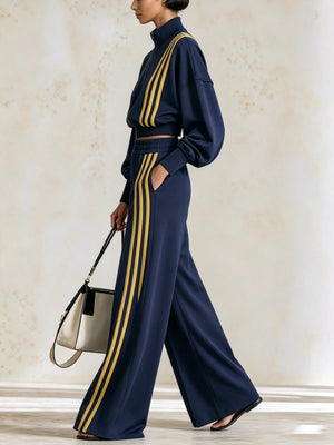 MINUCCIANO - Tuta blu con righe gialle, giacca cropped e pantaloni ampi