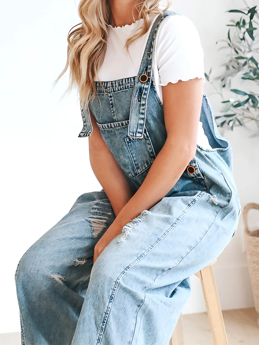 GIULIA - Salopette denim blu dal fit ampio distressed