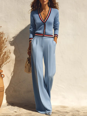 LICATA - Completo blu in maglia a righe con cardigan e pantaloni palazzo
