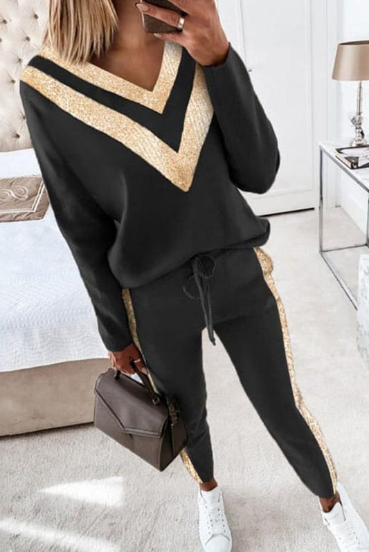 GLADIOLO - Set due pezzi nero con top di paillettes e pantaloni con coulisse
