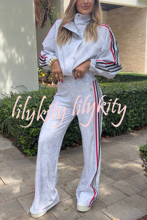 FLAVIA - Giacca sportiva a righe colorblock con stelle e zip collo alto