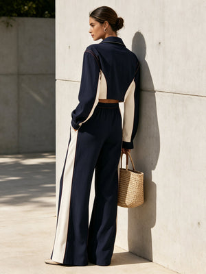 SCANDALE - Completo blu navy color block con camicia cropped e pantaloni ampi