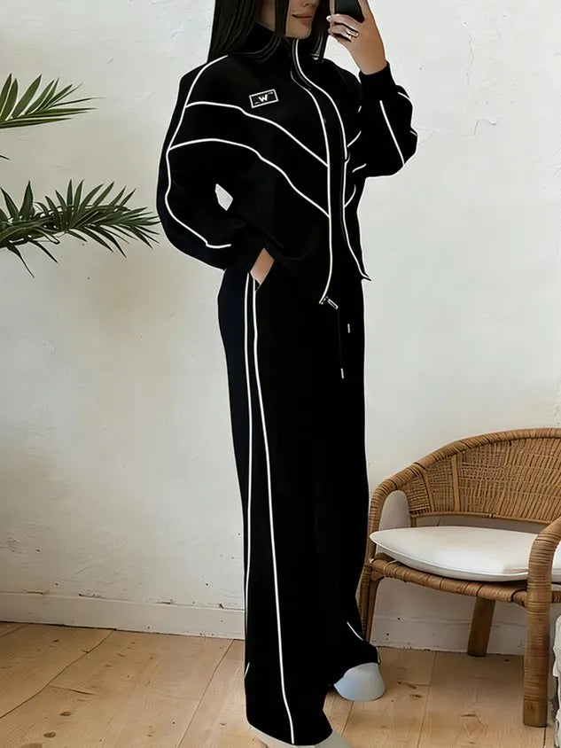Set due pezzi con giacca e pantaloni con linee sportive