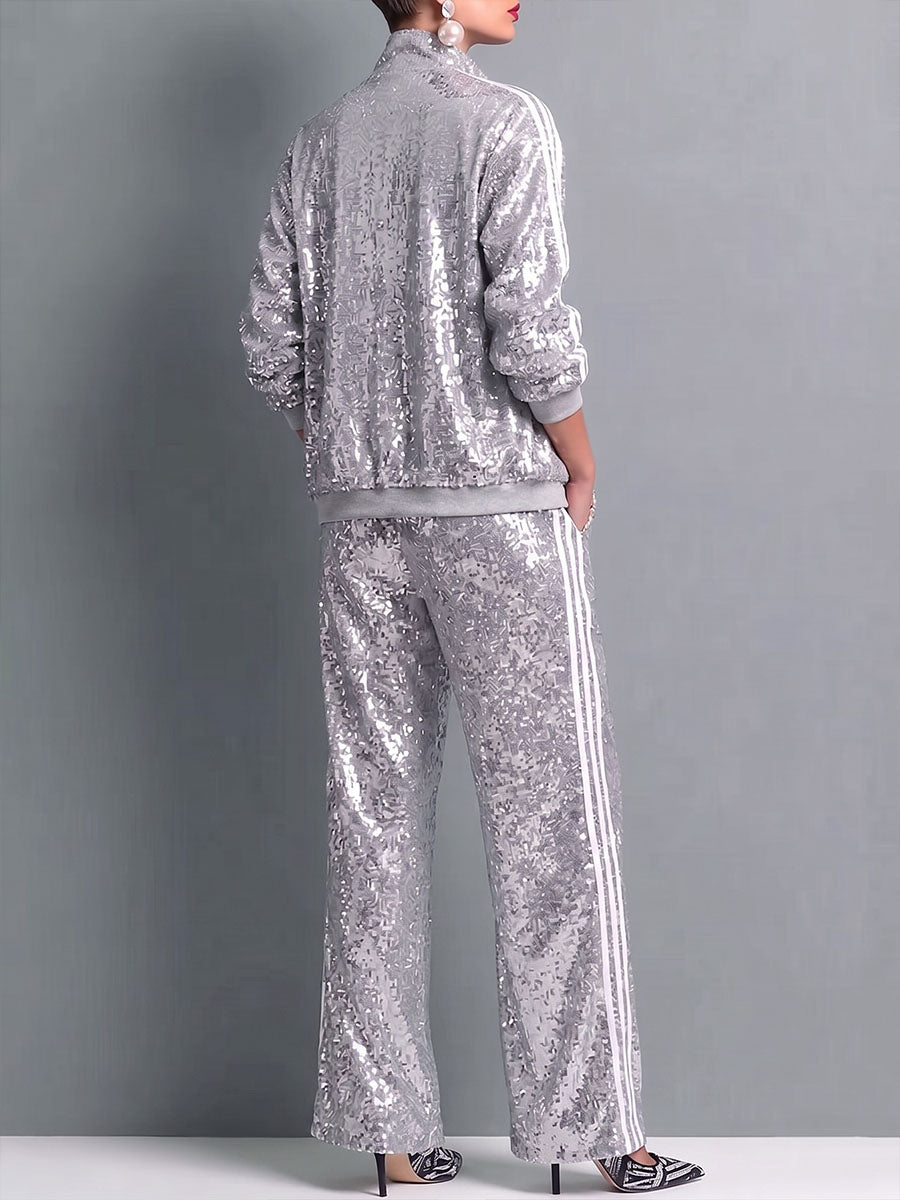 Set due pezzi con giacca e pantaloni con paillettes e righe laterali