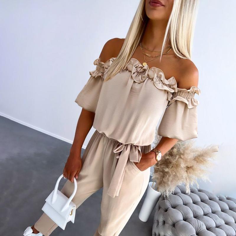GIULIA - Tuta off-shoulder con volant romantici