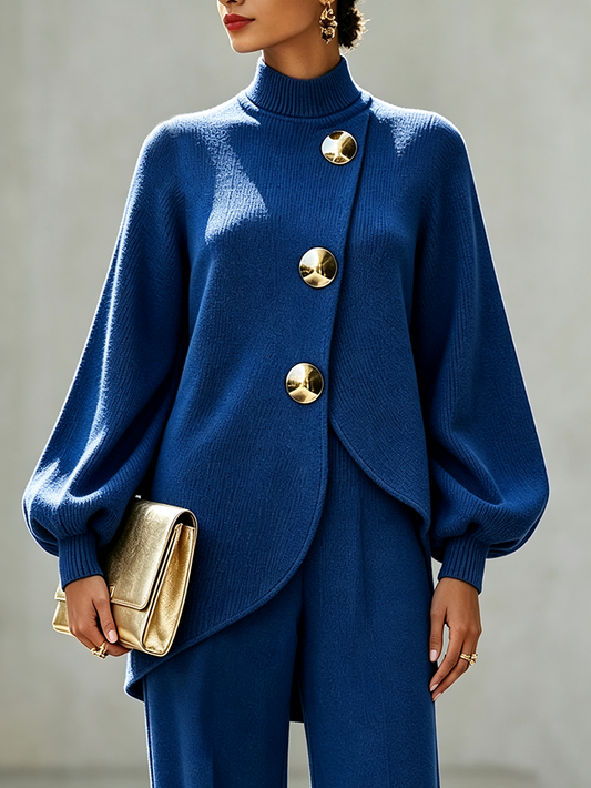 BACOLI - Top asimmetrico in maglia blu royal con bottone dorato