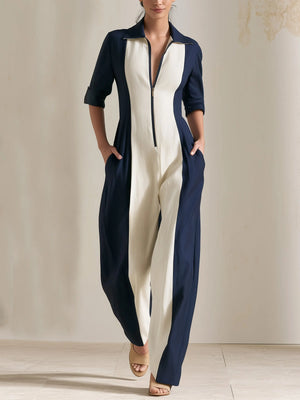 MAGASA - Tuta bicolore blu navy e avorio, maniche lunghe e zip frontale